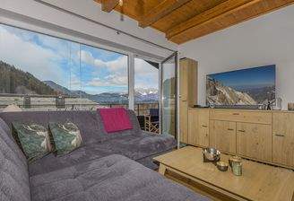 KITZIMMO-Dachgeschosswohnung an der Skipiste mit Kaiserblick kaufen - Immobilien Kitzbühel.