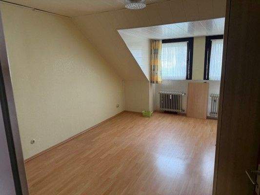 Zimmer mit Dachfenster