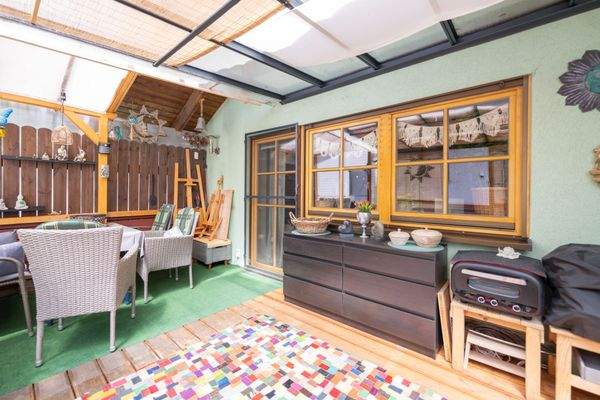 Überdachter Balkonbereich