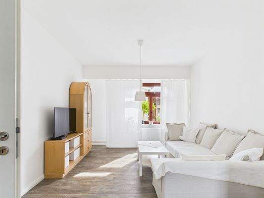 Wohnzimmer - Lütt Immobilien - Malente