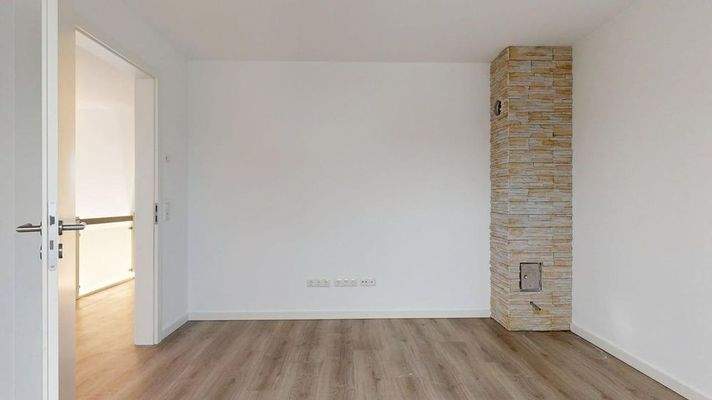 Schlafzimmer mit Kamin