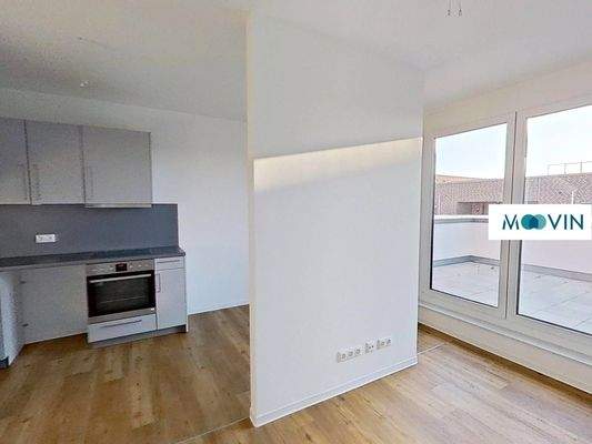 Ansicht II: Wohn- und Esszimmer mit offenem Küchenbereich