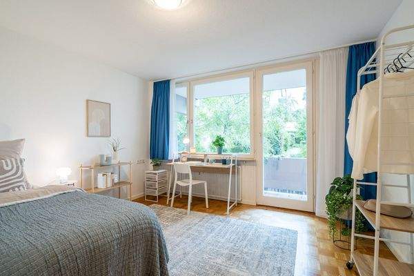 Schlafzimmer mit Balkon