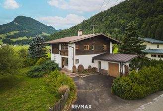 Kirchdorf Haus und Garage mit Einfahrt