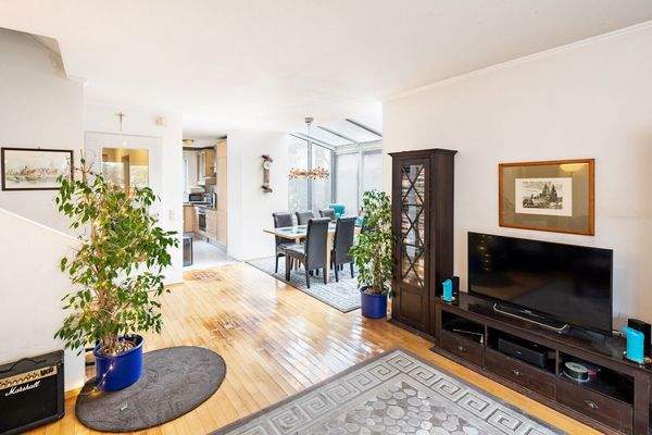 Wohnzimmer mit Wintergarten