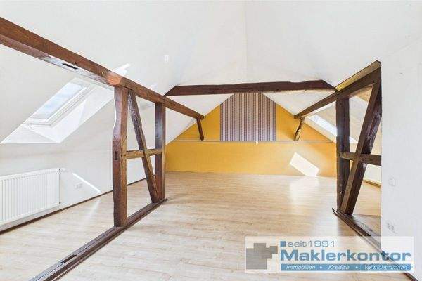 Dachgeschoss/Wohnbereich mit Kamin