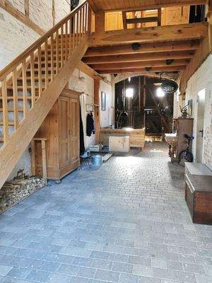 Die Tenne mit der Treppe in das Dachgeschoss