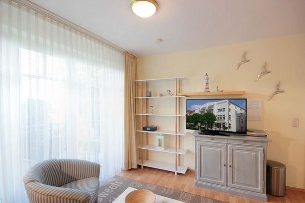 Wohnbereich mit Zugang zum Balkon