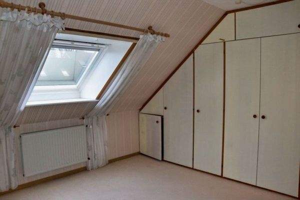 Schlafzimmer mit Einbauschrank