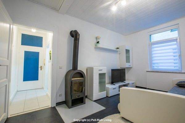 Wohnzimmer mit Kamin