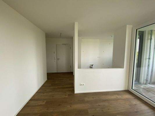 Musterfoto_Wohnzimmer mit offener Küche