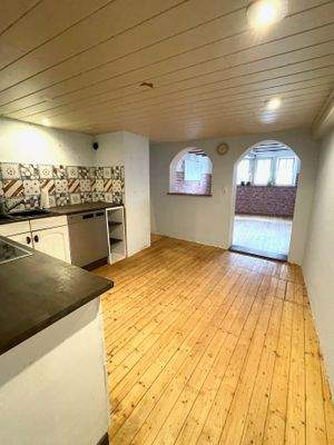 Innen_Haus 1_Obergeschoss_Küche und Wohnzimmer.jpe