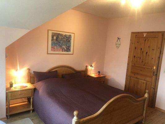 Schlafzimmer mit Balkonzugang