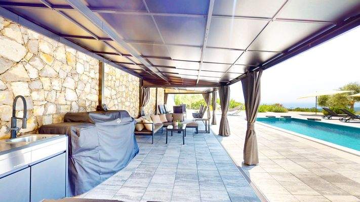 Sitzplatz mit Meerblick - Haus unten