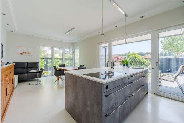 Open-plan dining and cooking area with terrace acc