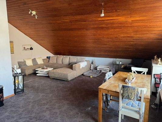 Wohnzimmer Dachgeschoss Wohn- und Geschäftshaus