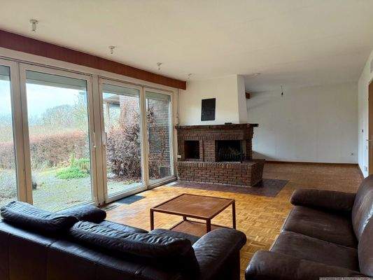 Wohnzimmer mit Kamin