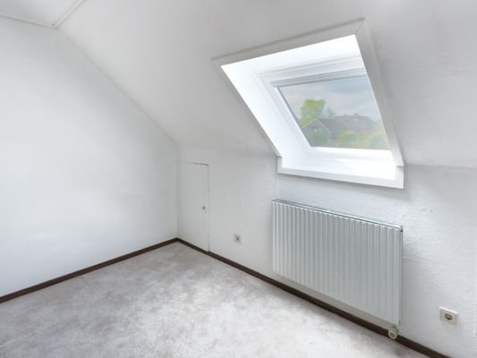 13. Kinderzimmer 3 im Obergeschoss.jpg
