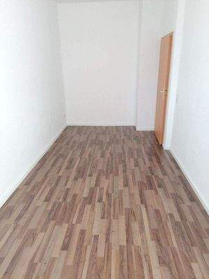 Schlafzimmer mit Laminat