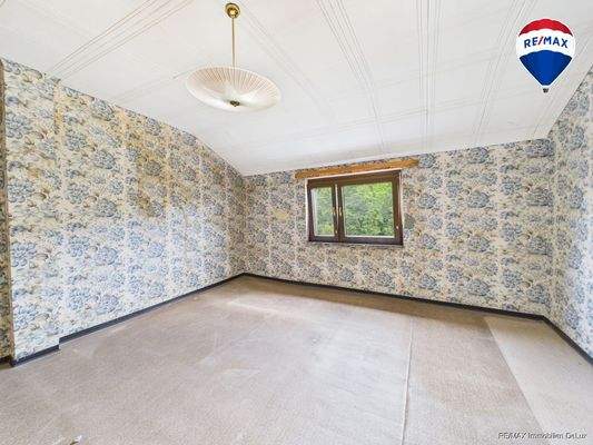 RE/MAX Immobilien DeLux Einfamilienhaus Nalbach Schlafzimmer