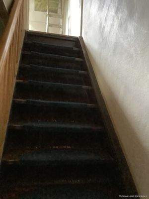 Holztreppe ins DG