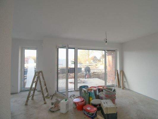 Wohnzimmer mit offener Küche