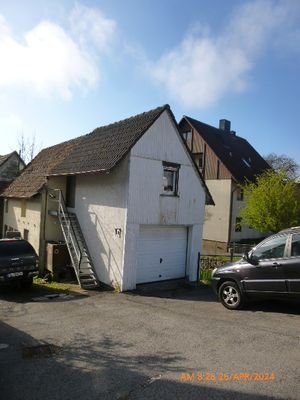Garagenhaus und Stellplatz
