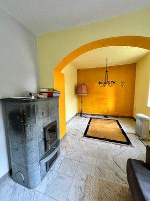 Zimmer mit Specksteinofen 