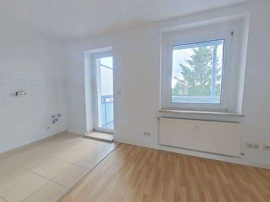 Wohnzimmer_mit_offener_Küche_