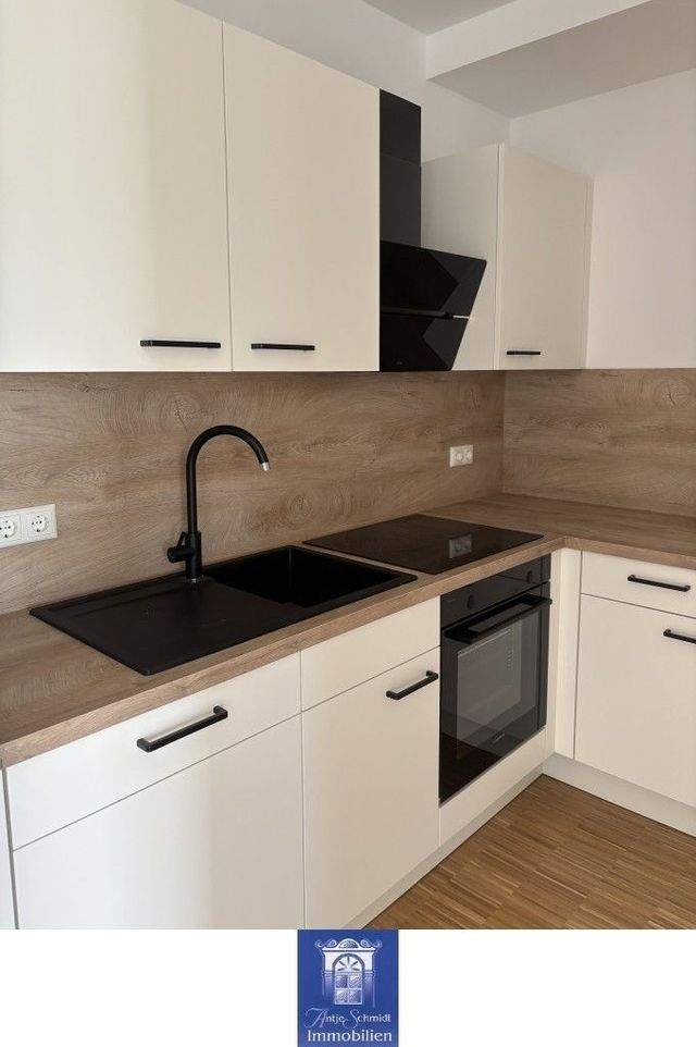 Erstbezug! Charmante Neubauwohnung mit Balkon, schicker EBK und Lift! - Foto 2