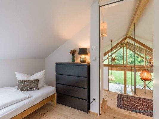 eines der Zimmer im OG