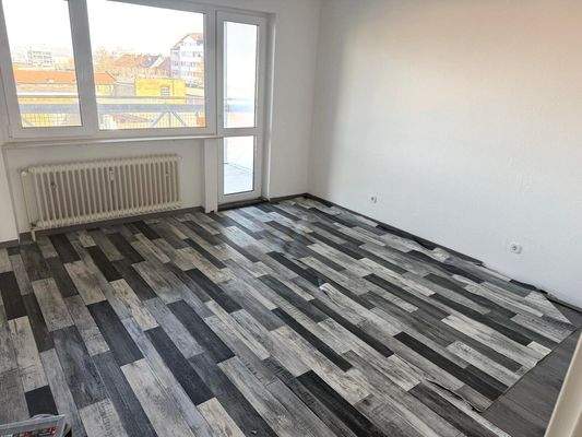 Schlafzimmer mit Zugang zum Balkon