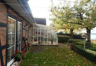Terrasse mit Wintergarten