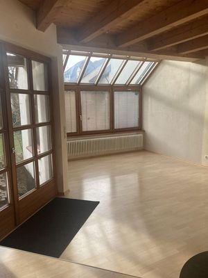 Wohnzimmer mit Wintergarten