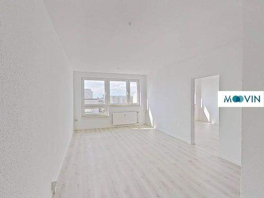 Ansicht I: Wohn- und Esszimmer mit offenem Küchenbereich