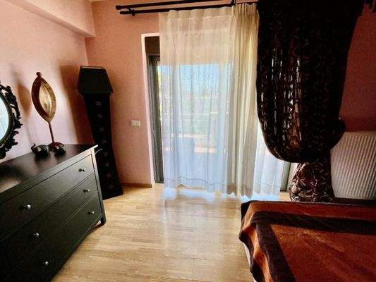 Kreta, Agios Nikolaos: Geräumige Wohnung im 2. Stock mit Panoramablick auf das Meer zu verkaufen