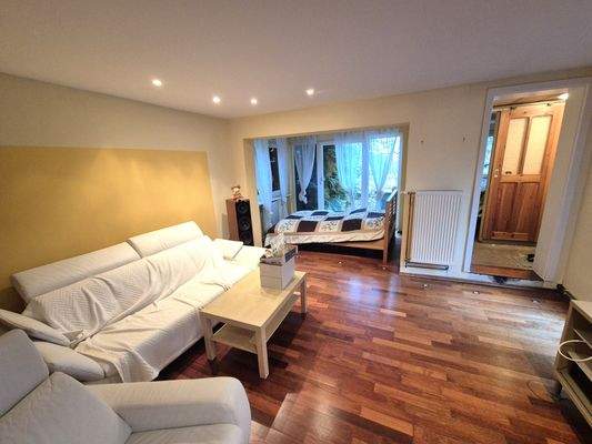 Wohnzimmer mit extra Schlafbereich