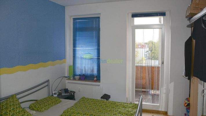 Schlafraum mit Balkonzugang