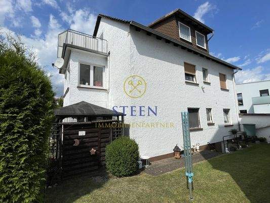 Hausrückseite mit Gartenanteil