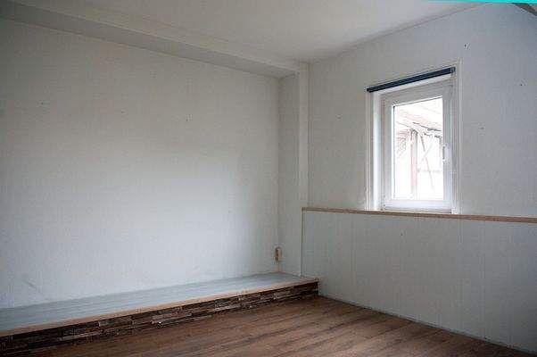 Wohnzimmer EG - Ansicht I  (seitlich zum Garten)