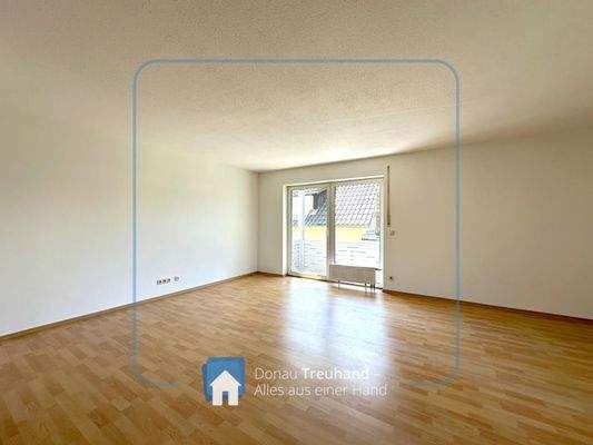 Wohnzimmer mit Balkon