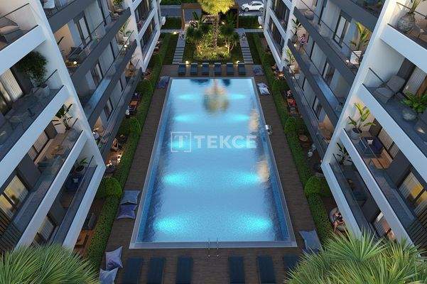 Apartments in a Complex with a Pool Near the Sea in İzmir Karşıyaka