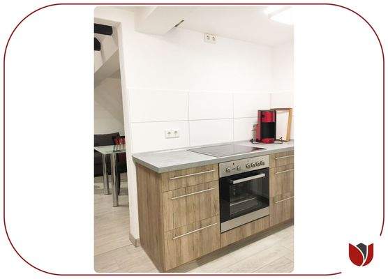 Dachgeschoss: Küche mit Einbauküche