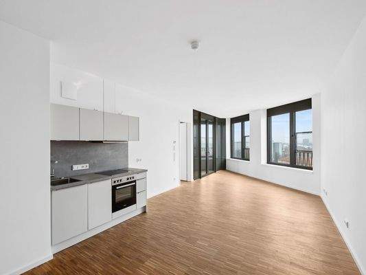 Wohnbereich mit EBK und Loggia