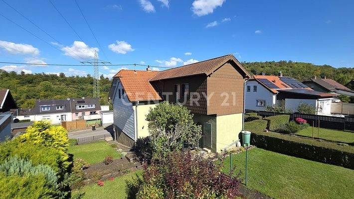 Rückseite des Hauses mit Ansicht des Gartens