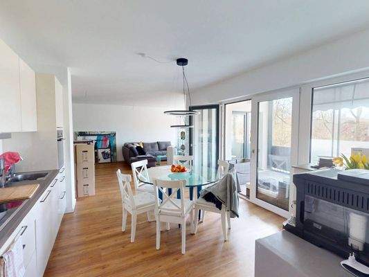 Ansicht IV: Wohn- und Esszimmer mit offenem Küchenbereich