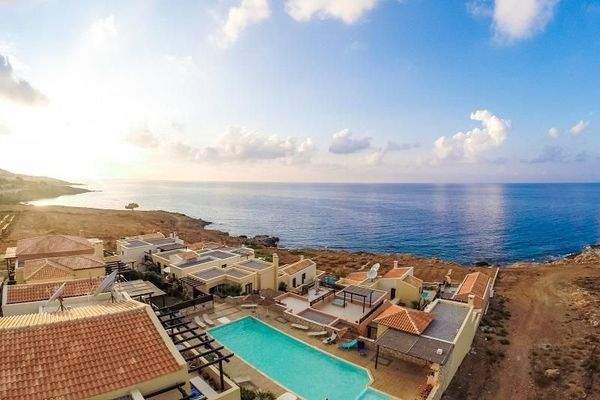 Kreta, Panormos: Haus mit 2 Wohnungen in einer Wohnanlage zu verkaufen