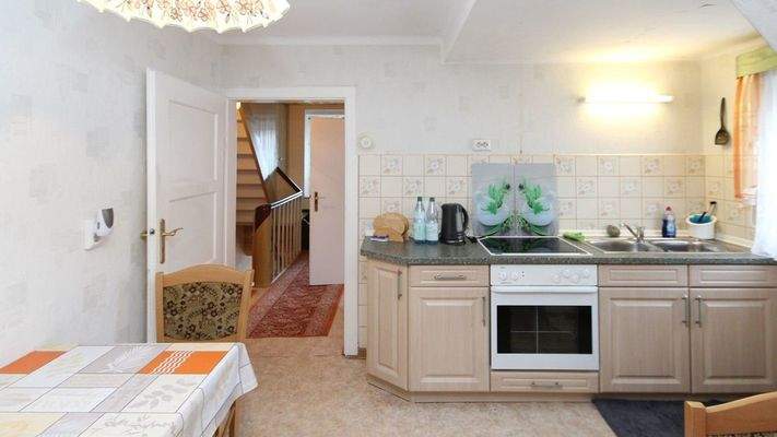 Weitere Küche mit Essbereich