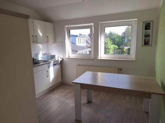 Wohnküche mit Einbauküche