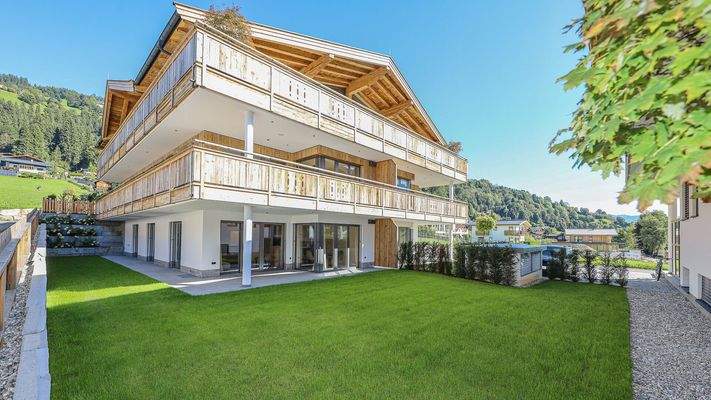 KITZIMMO-Luxuriöse Gartenwohnung mit eigenem Wellnessbereich - Immobilien Brixen.